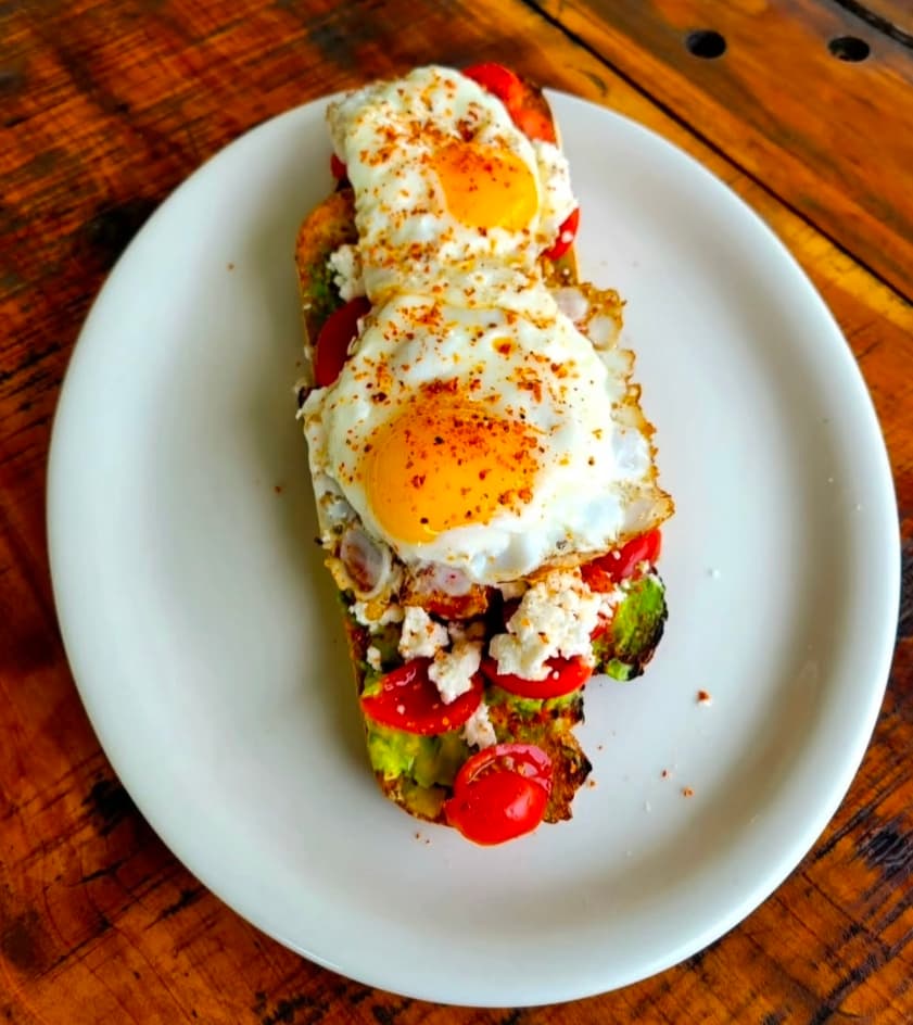 Avocado toast with fried eggs